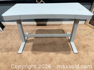 MaxSold Auction: White Electronic Adjustable Height Sit/Stand Desk - Prosper (Texas, USA) PARTNER MANAGED Moving Online Auction - Three Rivers Drive