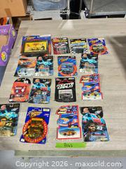 MaxSold Auction: 16 diecast racing car lot - Cocoa (Florida, USA) SELLER MANAGED Estate Sale Online Auction - Broadcast Court.