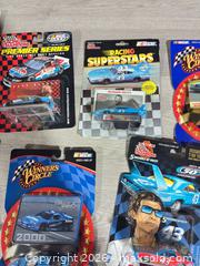 MaxSold Auction: 16 diecast racing car lot - Cocoa (Florida, USA) SELLER MANAGED Estate Sale Online Auction - Broadcast Court.