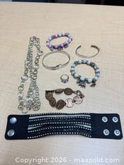 MaxSold Auction: Jar of Jewelry  - Cocoa (Florida, USA) SELLER MANAGED Estate Sale Online Auction - Broadcast Court.