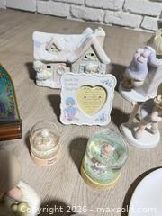 MaxSold Auction: Lot of Precious Moments and Book - Cocoa (Florida, USA) SELLER MANAGED Estate Sale Online Auction - Broadcast Court.