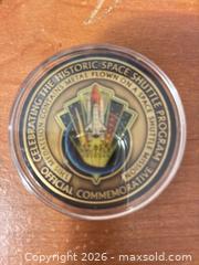 MaxSold Auction: NASA space shuttle era flown medallion coin - Cocoa (Florida, USA) SELLER MANAGED Estate Sale Online Auction - Broadcast Court.