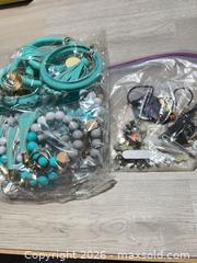 MaxSold Auction: New Keychains and Misc Jewelry  - Cocoa (Florida, USA) SELLER MANAGED Estate Sale Online Auction - Broadcast Court.