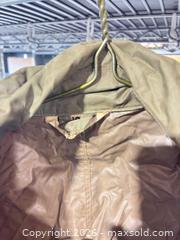 MaxSold Auction: Raincoat, men’s lightweight, top shade 179 Military - Cocoa (Florida, USA) SELLER MANAGED Estate Sale Online Auction - Broadcast Court.