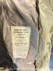 MaxSold Auction: Raincoat, men’s lightweight, top shade 179 Military - Cocoa (Florida, USA) SELLER MANAGED Estate Sale Online Auction - Broadcast Court.
