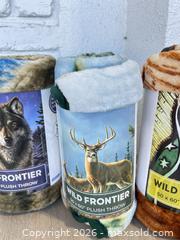 MaxSold Auction: Three wild frontier, plush throw blankets - Cocoa (Florida, USA) SELLER MANAGED Estate Sale Online Auction - Broadcast Court.