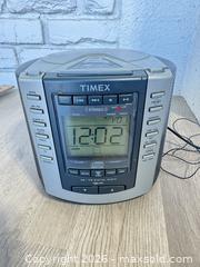 MaxSold Auction: Timex CD player clock radio  - Cocoa (Florida, USA) SELLER MANAGED Estate Sale Online Auction - Broadcast Court.