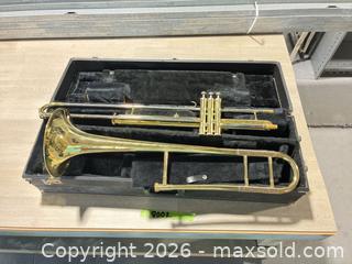MaxSold Auction: Trombone with Carrie case - Cocoa (Florida, USA) SELLER MANAGED Estate Sale Online Auction - Broadcast Court.