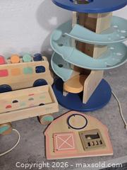 MaxSold Auction: KiwiCo & Panda Crate Wooden Push Walker, Pull Wagon & Toys - San Jose (California, USA) SELLER MANAGED Downsizing Online Auction - Paladin Drive