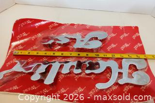 MaxSold Auction: Set of "Haulin' Ass" chrome mud flap weights - Lakeland (Florida, USA) SELLER MANAGED Reseller Online Auction - Dove Meadow Trail