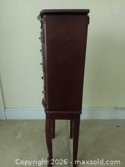 MaxSold Auction: Traditional Dark Cherry Jewelry Armoire with Mirror - Columbia (South Carolina, USA) SELLER MANAGED Estate Sale Online Auction - Greengate Drive
