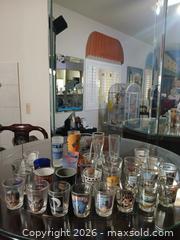 MaxSold Auction: Assorted Space-Themed Shot Glasses (31+) - Las Vegas (Nevada, USA) PARTNER MANAGED Estate Sale Online Auction - Bright Sun Court