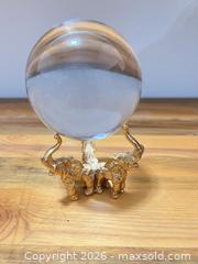 MaxSold Auction: Clear Crystal Display Orb with Gold Elephant Tripod Stand - Las Vegas (Nevada, USA) PARTNER MANAGED Estate Sale Online Auction - Bright Sun Court