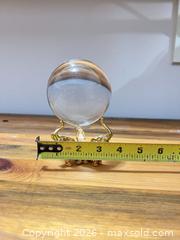 MaxSold Auction: Clear Crystal Display Orb with Gold Elephant Tripod Stand - Las Vegas (Nevada, USA) PARTNER MANAGED Estate Sale Online Auction - Bright Sun Court