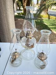 MaxSold Auction: Lot of 3 Clear Glass Oil Lamps with Brass Burners - Las Vegas (Nevada, USA) PARTNER MANAGED Estate Sale Online Auction - Bright Sun Court