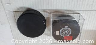 MaxSold Auction: (2) NHL NY RANGERS HOCKEY PUCKS - COLLECTIBLES  - Rockaway (New Jersey, USA) SELLER MANAGED Downsizing Online Auction - Miami Trail