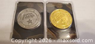 MaxSold Auction: 2 POKEMON COINS IN CASES - Rockaway (New Jersey, USA) SELLER MANAGED Downsizing Online Auction - Miami Trail