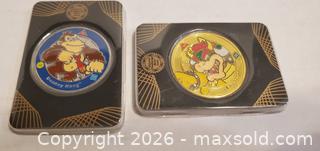 MaxSold Auction: 2 POKEMON COINS IN CASES - Rockaway (New Jersey, USA) SELLER MANAGED Downsizing Online Auction - Miami Trail