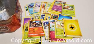 MaxSold Auction: POKEMON CARDS IN COLLECTOR TIN  - Rockaway (New Jersey, USA) SELLER MANAGED Downsizing Online Auction - Miami Trail