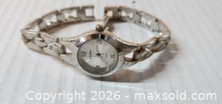 MaxSold Auction: VINTAGE SILVER TONE LADIES WRISTWATCH DELOIT  - Rockaway (New Jersey, USA) SELLER MANAGED Downsizing Online Auction - Miami Trail