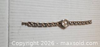 MaxSold Auction: VINTAGE SILVER TONE LADIES WRISTWATCH DELOIT  - Rockaway (New Jersey, USA) SELLER MANAGED Downsizing Online Auction - Miami Trail