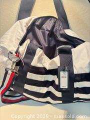 MaxSold Auction: Tommy Hilfiger Large Shoulder Bag with Zipper Closure - San Jose (California, USA) SELLER MANAGED Downsizing Online Auction -  Topaz Avenue (STORAGE)
