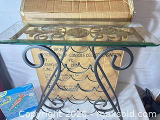 MaxSold Auction: Matte Black Metal Wine Rack Console Table with Glass Top - Sunnyvale (California, USA) SELLER MANAGED Reseller Online Auction - Reseda Drive