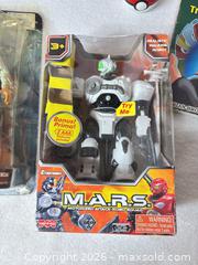 MaxSold Auction: Mixed Collectible Toys: YuYu Hakusho, M.A.R.S., Pokémon & Promo Toys - Sunnyvale (California, USA) SELLER MANAGED Reseller Online Auction - Reseda Drive