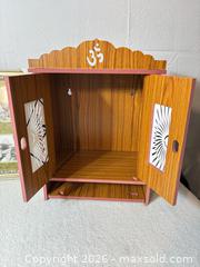MaxSold Auction: Wall-Mounted Puja/Altar Cabinet with Two Photo Frames - Sunnyvale (California, USA) SELLER MANAGED Reseller Online Auction - Reseda Drive