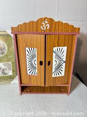 MaxSold Auction: Wall-Mounted Puja/Altar Cabinet with Two Photo Frames - Sunnyvale (California, USA) SELLER MANAGED Reseller Online Auction - Reseda Drive