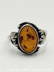 MaxSold Auction: Amber 925 Sterling Silver Ring 3.4g Size 5 - Esquimalt (British Columbia, Canada) PARTNER MANAGED Reseller Online Auction -  Lampson Street
