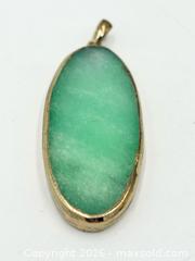 MaxSold Auction: Green Gem Stone Pendant  - Esquimalt (British Columbia, Canada) PARTNER MANAGED Reseller Online Auction -  Lampson Street