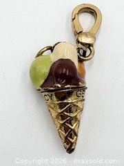 MaxSold Auction: Ice Cream Pendant Juicy Couture  - Esquimalt (British Columbia, Canada) PARTNER MANAGED Reseller Online Auction -  Lampson Street