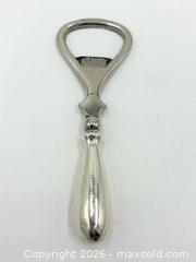 MaxSold Auction: Silver Bottle Opener 27.32g - Esquimalt (British Columbia, Canada) PARTNER MANAGED Reseller Online Auction -  Lampson Street