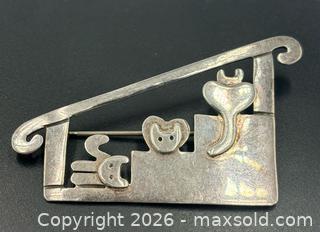 MaxSold Auction: Sterling Silver Cat Brooch by Anne Harvey - Esquimalt (British Columbia, Canada) PARTNER MANAGED Reseller Online Auction -  Lampson Street