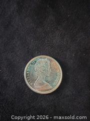 MaxSold Auction: 1965 Silver Canada Coin  - Loyalist (Ontario, Canada) SELLER MANAGED Downsizing Online Auction - Somerset Drive