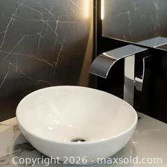 MaxSold Auction: 14" Waterfall faucet (New in the original sealed packaging) - Toronto (Ontario, Canada) SELLER MANAGED Reseller Online Auction - Magnetic Drive
