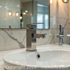 MaxSold Auction: Brushed nickel faucet (New in the original sealed packaging) - Toronto (Ontario, Canada) SELLER MANAGED Reseller Online Auction - Magnetic Drive