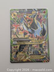 MaxSold Auction: M Houndoom EX #154 Pokémon -2015 - Langley (British Columbia, Canada) SELLER MANAGED Reseller Online Auction - 68 Avenue