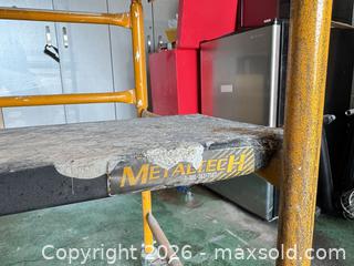 MaxSold Auction: Metaltech Yellow Rolling Scaffold / Scaffold Tower - Toronto (Ontario, Canada) SELLER MANAGED Moving Online Auction - Saint Clair Avenue West
