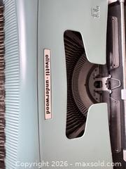 MaxSold Auction: Olivetti Underwood Aqua/Teal Portable Manual Typewriter - Toronto (Ontario, Canada) SELLER MANAGED Moving Online Auction - Saint Clair Avenue West