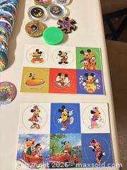 MaxSold Auction: 100+ Mixed Pogs/Tazos Lot — Disney, Sports, Cartoons - Wheatland (New York, USA) SELLER MANAGED Reseller Online Auction - State Street