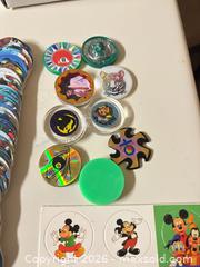 MaxSold Auction: 100+ Mixed Pogs/Tazos Lot — Disney, Sports, Cartoons - Wheatland (New York, USA) SELLER MANAGED Reseller Online Auction - State Street