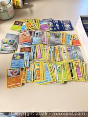 MaxSold Auction: Large Pokémon card lot - Wheatland (New York, USA) SELLER MANAGED Reseller Online Auction - State Street