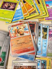 MaxSold Auction: Large Pokémon card lot - Wheatland (New York, USA) SELLER MANAGED Reseller Online Auction - State Street