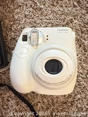 MaxSold Auction: Mixed Electronics Lot: DVD Player, Instax, Disc Camera, Walkman - Wheatland (New York, USA) SELLER MANAGED Reseller Online Auction - State Street