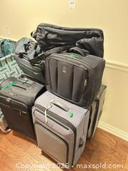 MaxSold Auction: Assorted Softside Carry-On Luggage Lot with Wheels & Handles B - Niagara Falls (Ontario, Canada) Moving Online Auction - January Drive