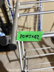 MaxSold Auction: Folding 3-step ladder & drying rack B - Niagara Falls (Ontario, Canada) Moving Online Auction - January Drive