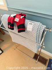 MaxSold Auction: Freestanding Quilt Stand with Blanket and Adult Knit Mittens - Niagara Falls (Ontario, Canada) Moving Online Auction - January Drive