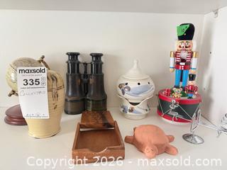 MaxSold Auction: Mixed Collectibles Lot: Nutcracker, Binoculars, Game, Pot, Tray C - Niagara Falls (Ontario, Canada) Moving Online Auction - January Drive